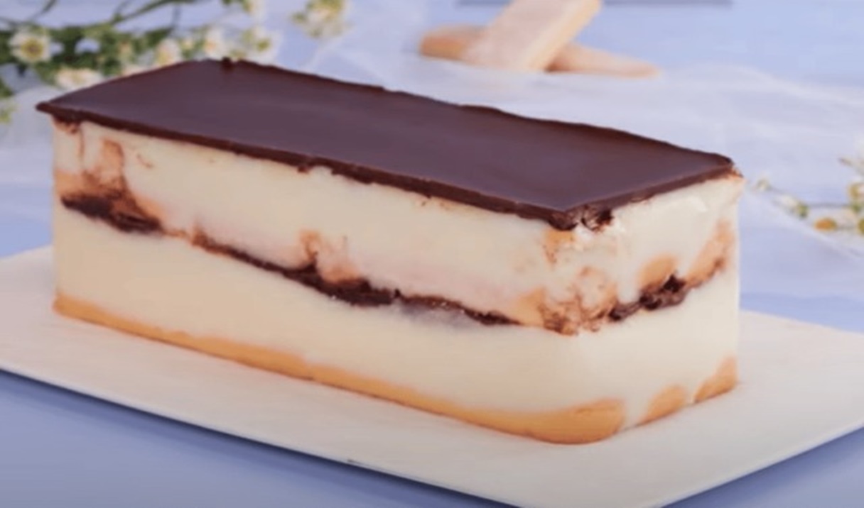 Astăzi vom pregăti un tort delicios cu cremă și ciocolată preparat în cutie de lapte! Pregătirea acestui desert fără coacere este foarte ușoară